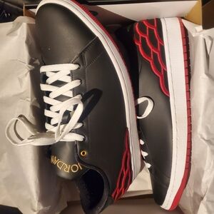 Jordan Black and Red Sneakers with Gold Accents